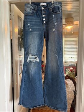 High-Rise Dark Blue Flare Jeans with Button Fly